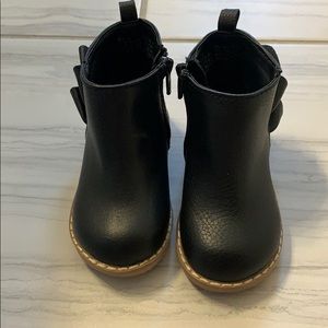 Size 6 toddler black boots. Never worn.